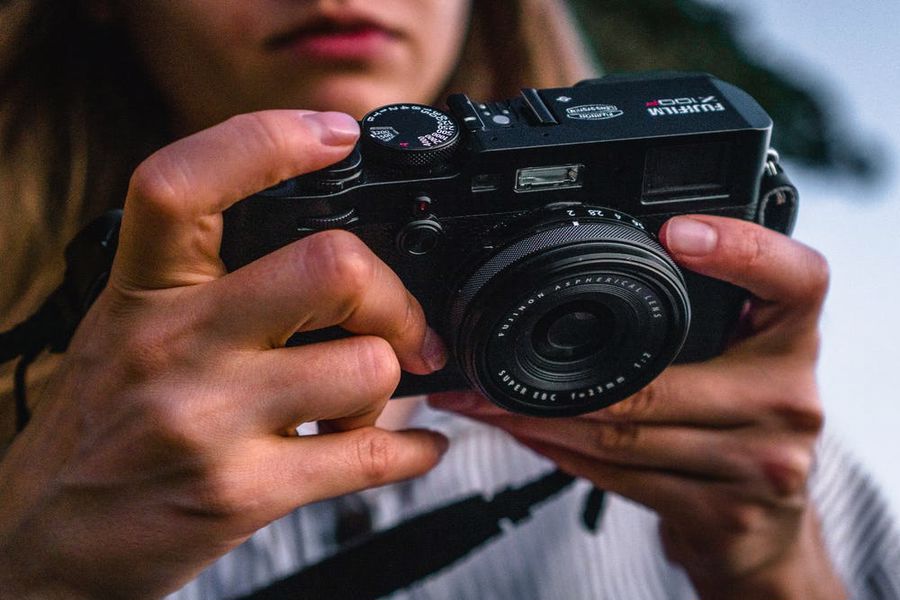 Woman checking her camera settings
